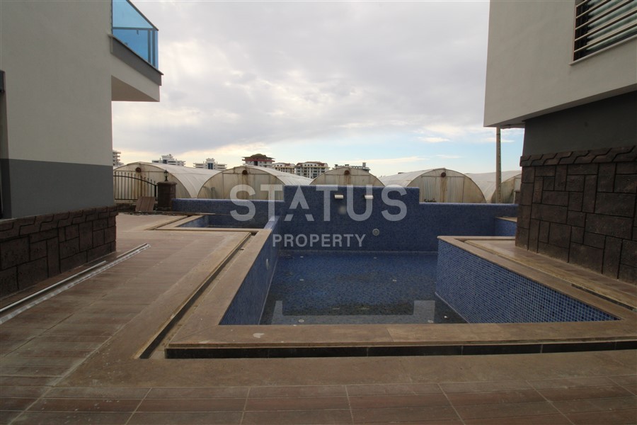 Новая двухкомнатная квартира в Махмутларе, 50 м2 фото 7