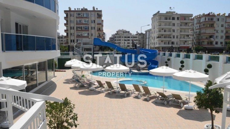 Апартаменты 1+1 в элитном комплексе, 69 м2. Махмутлар, Алания. фото 1