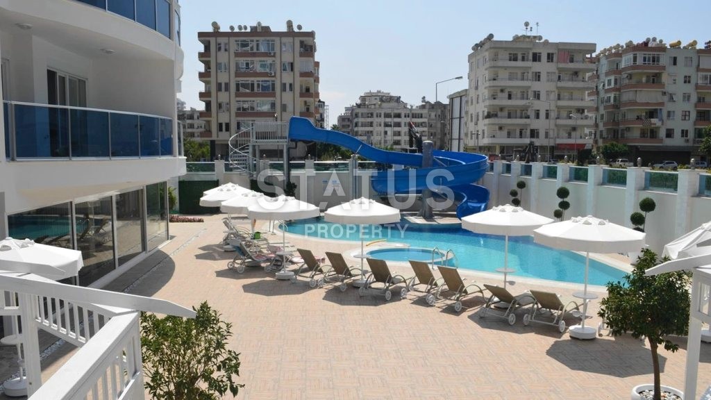 Апартаменты 1+1 в элитном комплексе, 69 м2. Махмутлар, Алания. фото 1