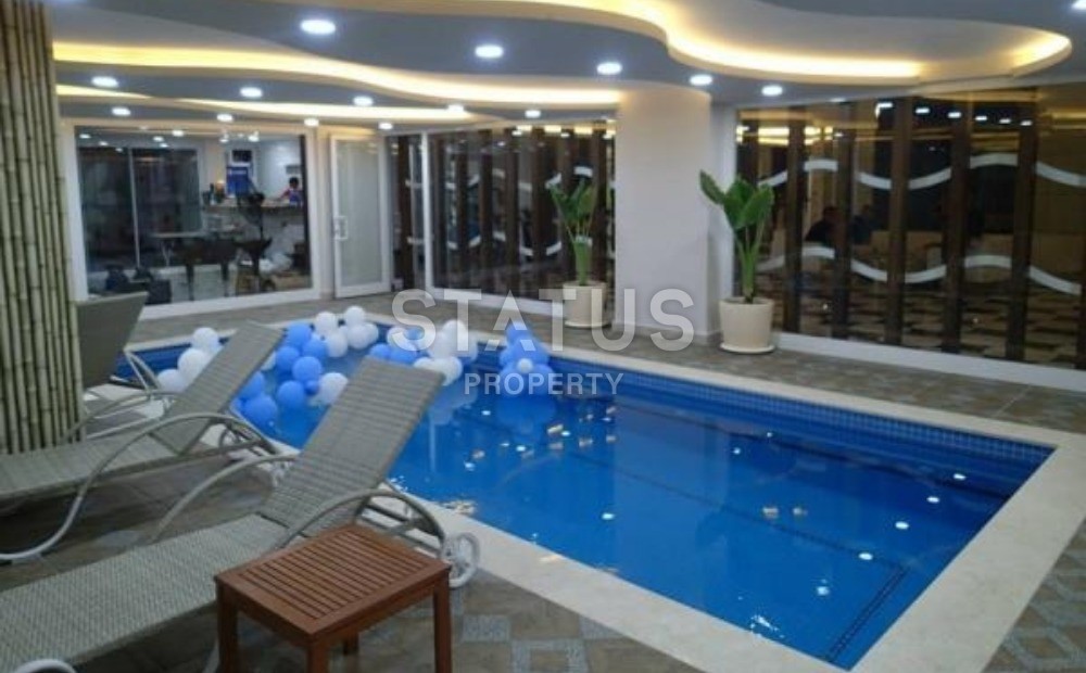 Квартира 1+1 в центре Махмутлара в элитном комплексе, 65 м2 фото 7