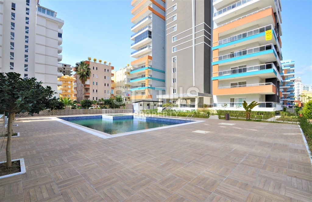 Просторная квартира в 200 метрах от моря в районе Махмутлар 70 кв.м. фото 1