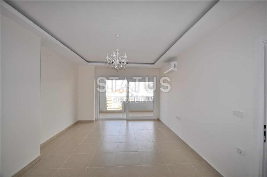 Просторная квартира в 200 метрах от моря в районе Махмутлар 70 кв.м. фото 3