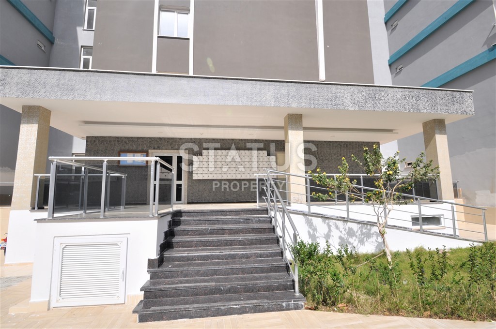 Просторная квартира в 200 метрах от моря в районе Махмутлар 70 кв.м. фото 4