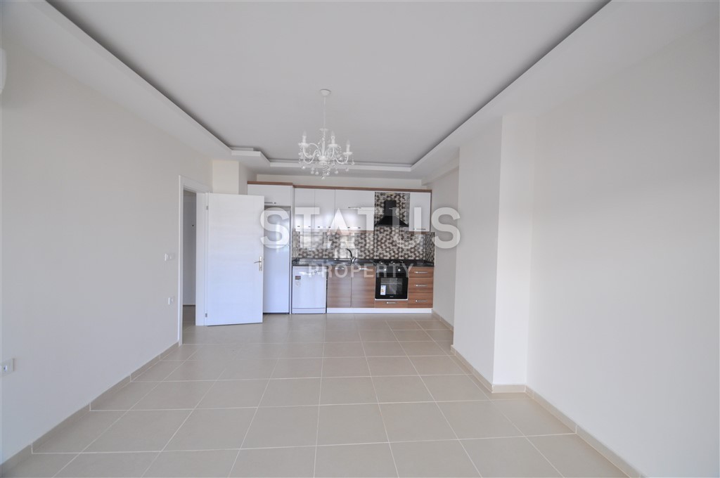 Просторная квартира в 200 метрах от моря в районе Махмутлар 70 кв.м. фото 7