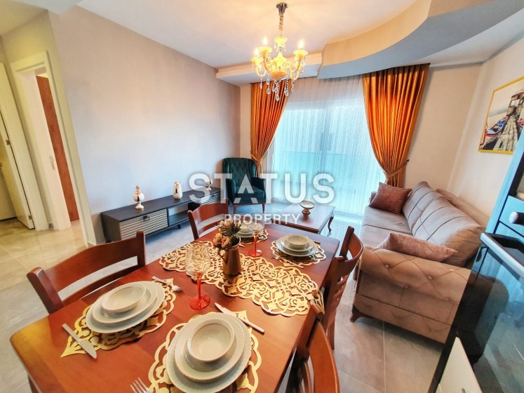 Апартаменты 1+1 с мебелью и техникой, 64 м2. Махмутлар, Алания. фото 1
