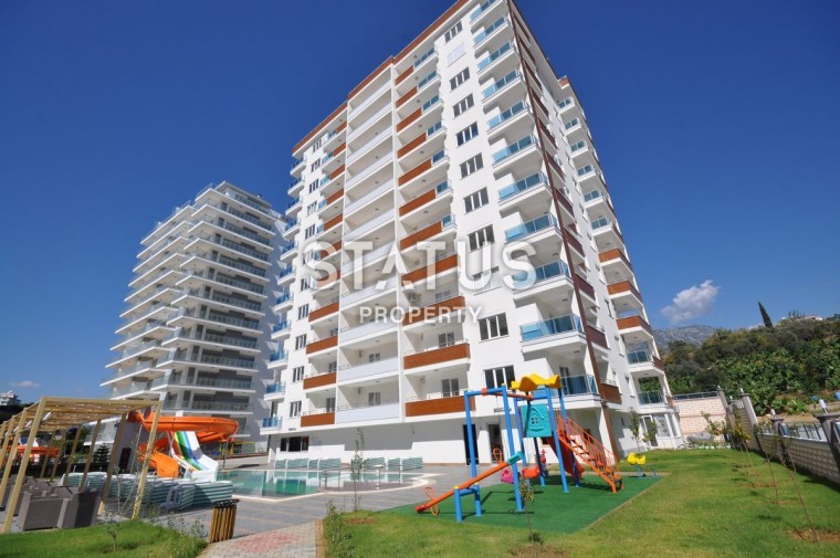 Двухкомнатная квартира в Махмутларе, 76 м2 фото 1