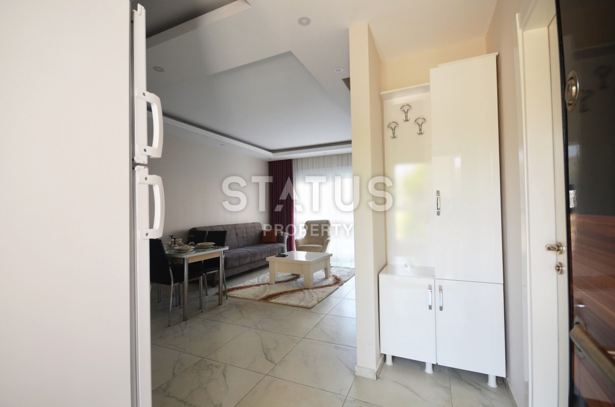 Двухкомнатная квартира с мебелью в центре района Махмутлар, 60 м2 фото 16