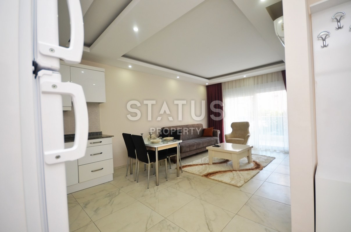 Двухкомнатная квартира с мебелью в центре района Махмутлар, 60 м2 фото 18