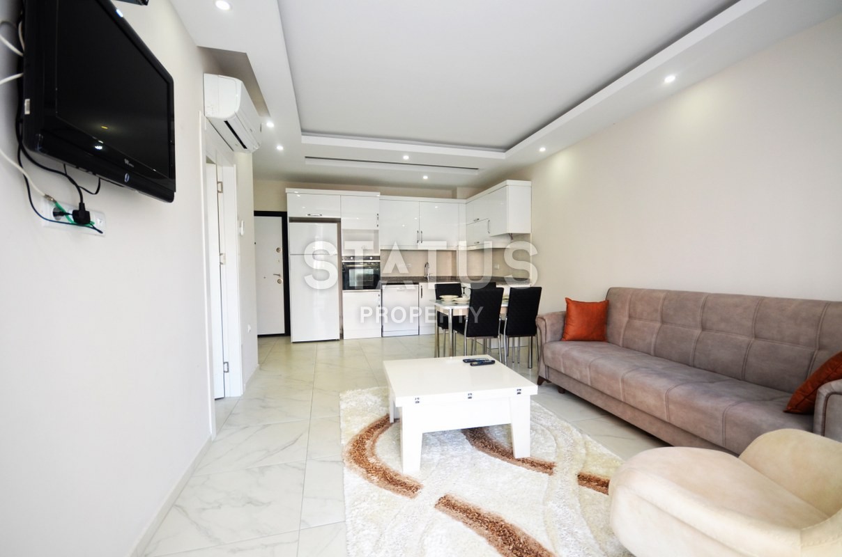 Двухкомнатная квартира с мебелью в центре района Махмутлар, 60 м2 фото 19