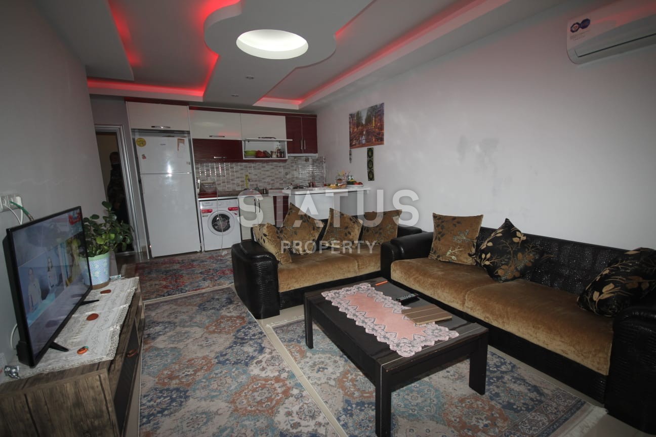 One-bedroom apartment with a view of the Taurus Mountains 65 m2. Mahmutlar, Alanya. фото 4