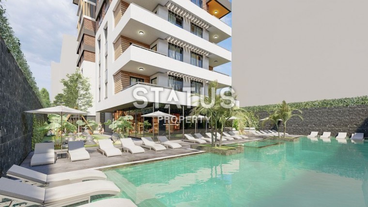 Новый современный инвестиционный проект у моря в центре Махмутлара фото 1