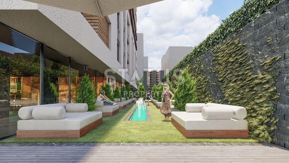 Новый современный инвестиционный проект у моря в центре Махмутлара фото 4