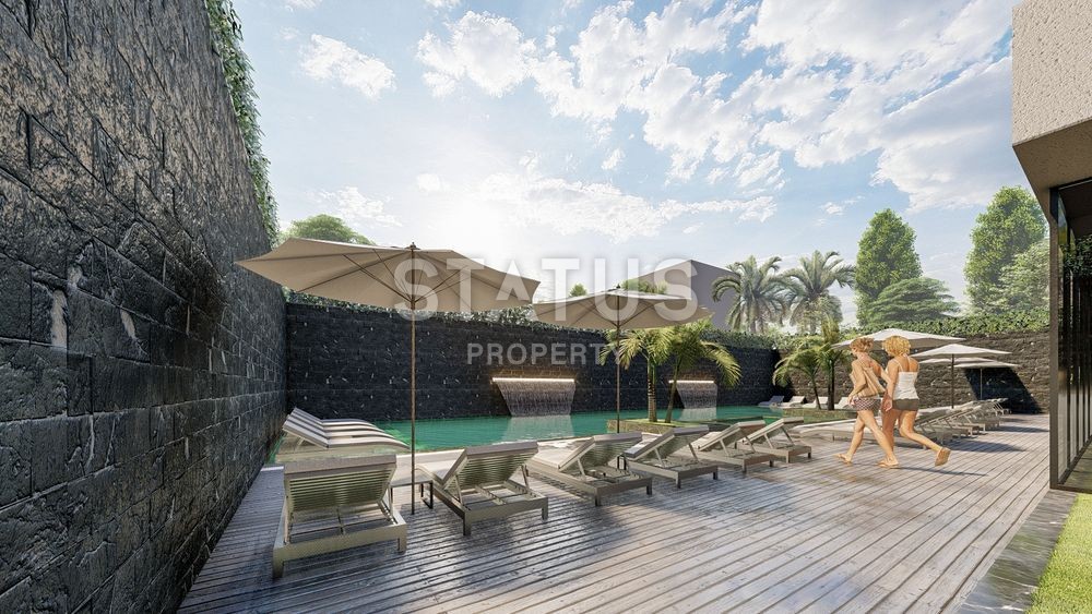 Новый современный инвестиционный проект у моря в центре Махмутлара фото 12