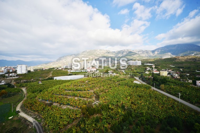 Трехкомнатная квартира в Махмутларе с видом на горы и море, 85 м2 фото 1