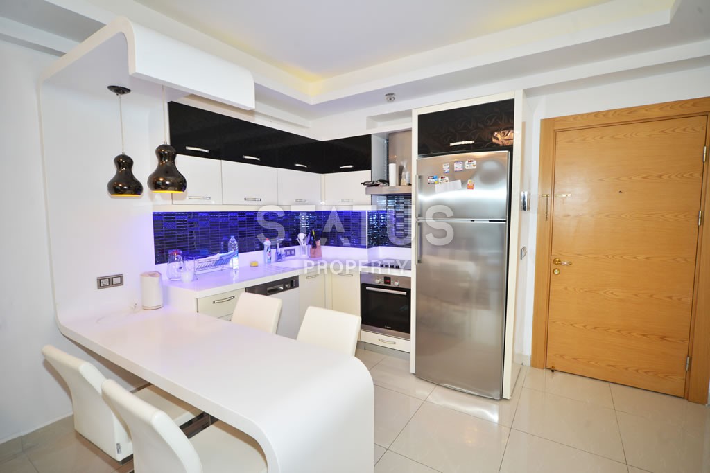 Двухкомнатная квартира с видом на горы в шикарном комплексе, 73 м2 в Махмутларе. фото 25