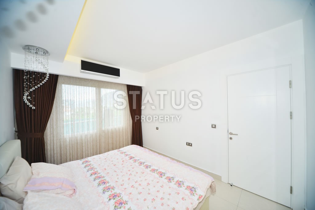 Двухкомнатная квартира с видом на горы в шикарном комплексе, 73 м2 в Махмутларе. фото 26