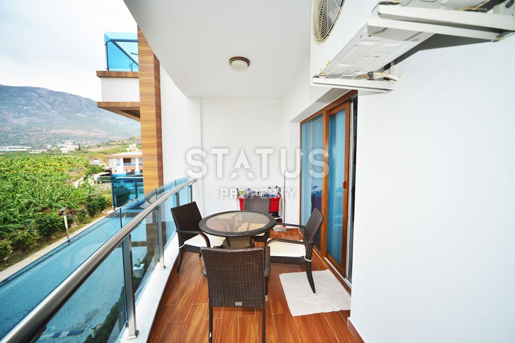 Двухкомнатная квартира с видом на горы в шикарном комплексе, 73 м2 в Махмутларе. фото 33