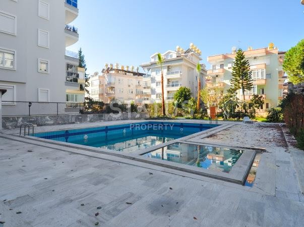Квартира 1+1 с бассейном, 68 м2 в центральном районе Алании. фото 2