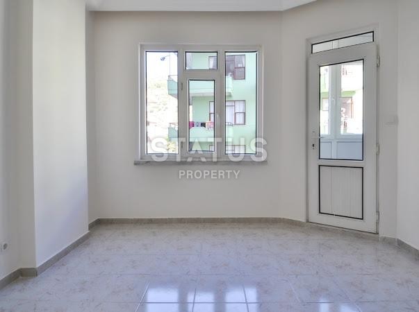 Квартира 1+1 с бассейном, 68 м2 в центральном районе Алании. фото 10