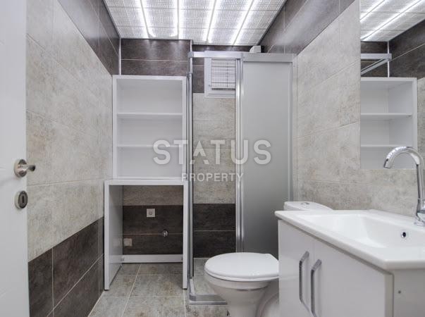 Квартира 1+1 с бассейном, 68 м2 в центральном районе Алании. фото 11