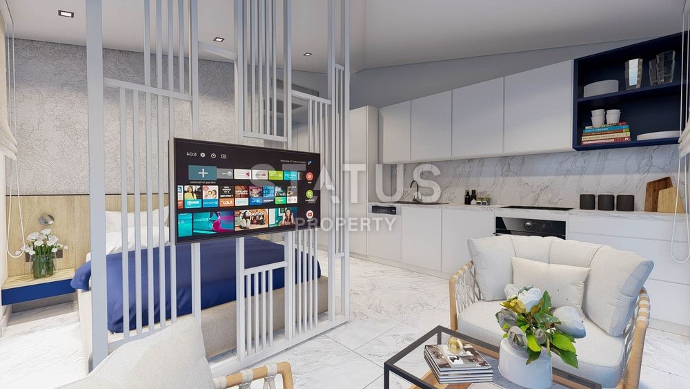 Apartments 0+1 and 1+1 in a complex under construction in the center of Alanya. фото 11