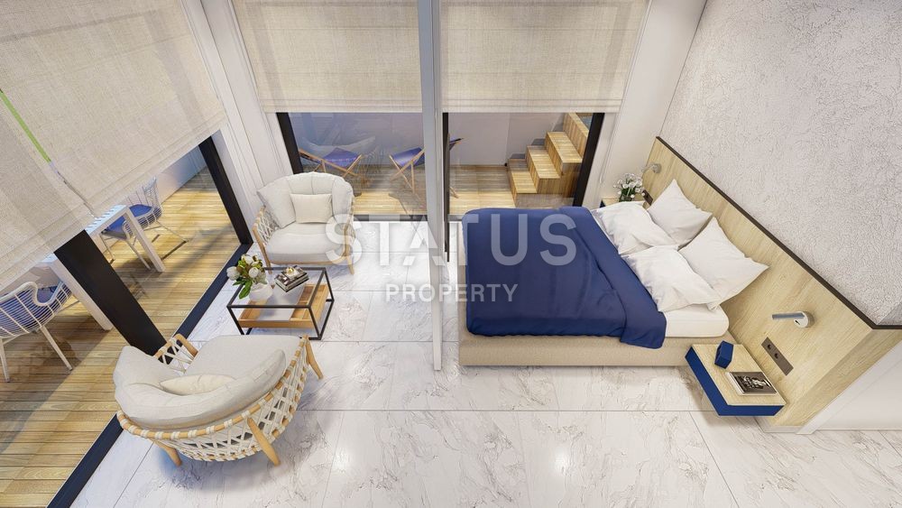 Apartments 0+1 and 1+1 in a complex under construction in the center of Alanya. фото 12