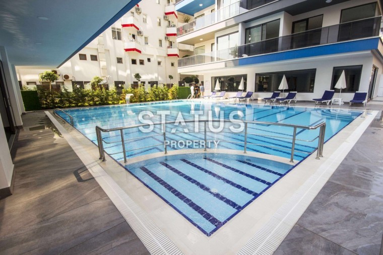 Апартаменты 1+1 с видом на море на первой береговой линии, 70 м2 в Махмутларе фото 1