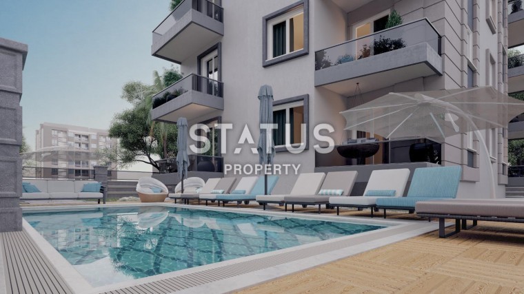 Новый инвестиционный проект в районе Махмутлар, квартиры планировок 1+1, 2+1, 3+1, площадь 45-170м2 фото 1