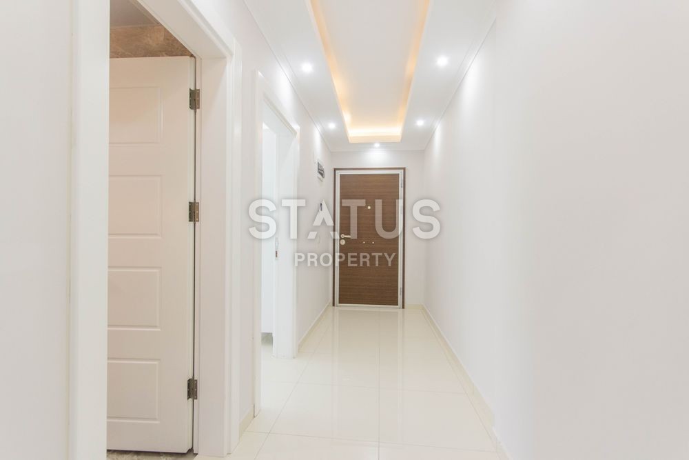 Апартаменты 1+1 в комплексе, рядом с морем в Махмутларе, 75 м2. фото 6