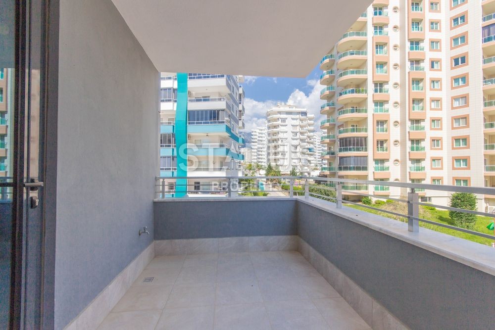 Апартаменты 1+1 в комплексе, рядом с морем в Махмутларе, 75 м2. фото 11