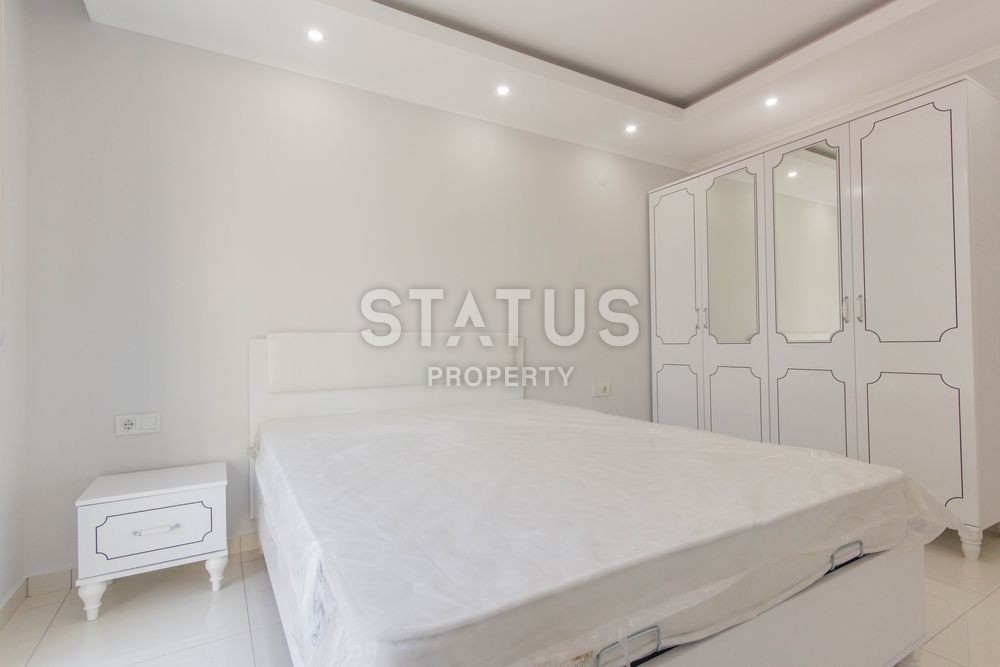 Апартаменты 1+1 в комплексе, рядом с морем в Махмутларе, 75 м2. фото 15