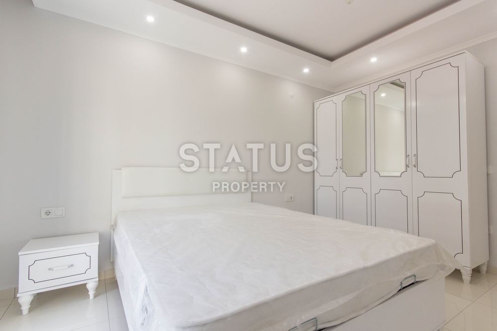 Апартаменты 1+1 в комплексе, рядом с морем в Махмутларе, 75 м2. фото 18