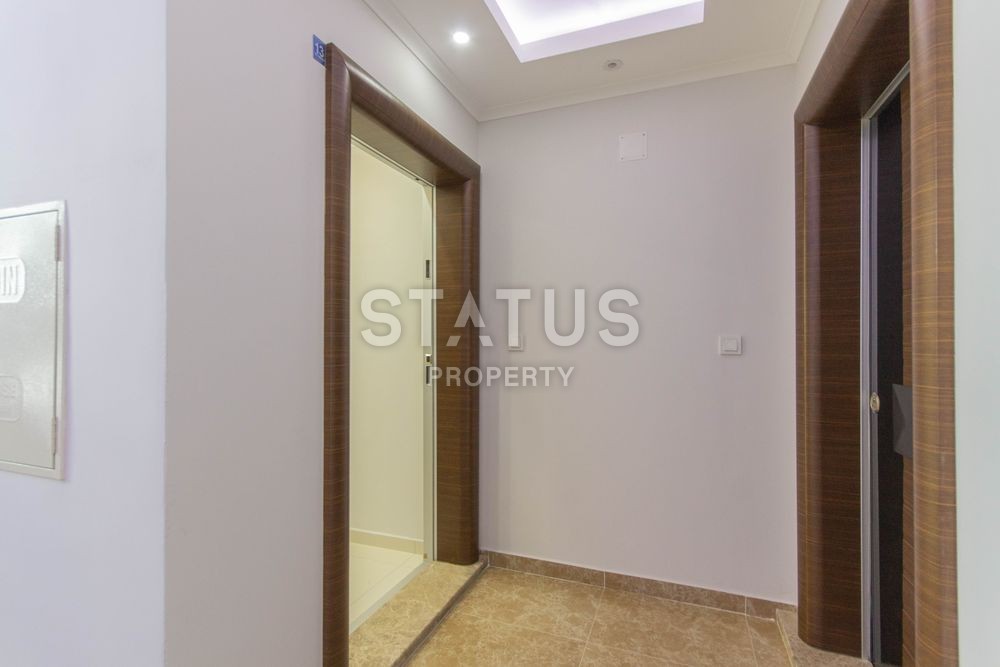 Апартаменты 1+1 в комплексе, рядом с морем в Махмутларе, 75 м2. фото 20