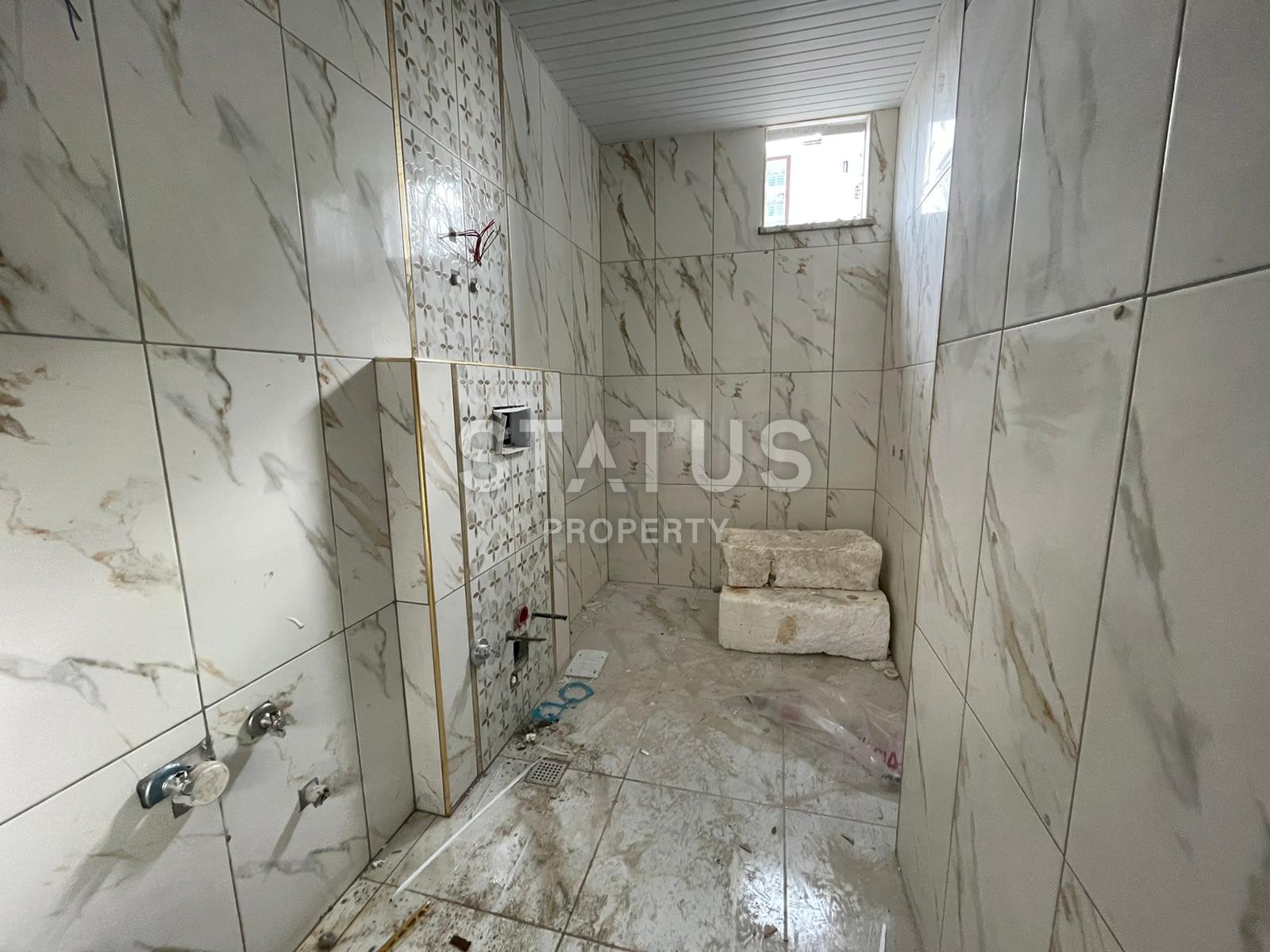 Апартаменты 1+1 в новом комплексе в центре Махмутлара, 45 м2. фото 9