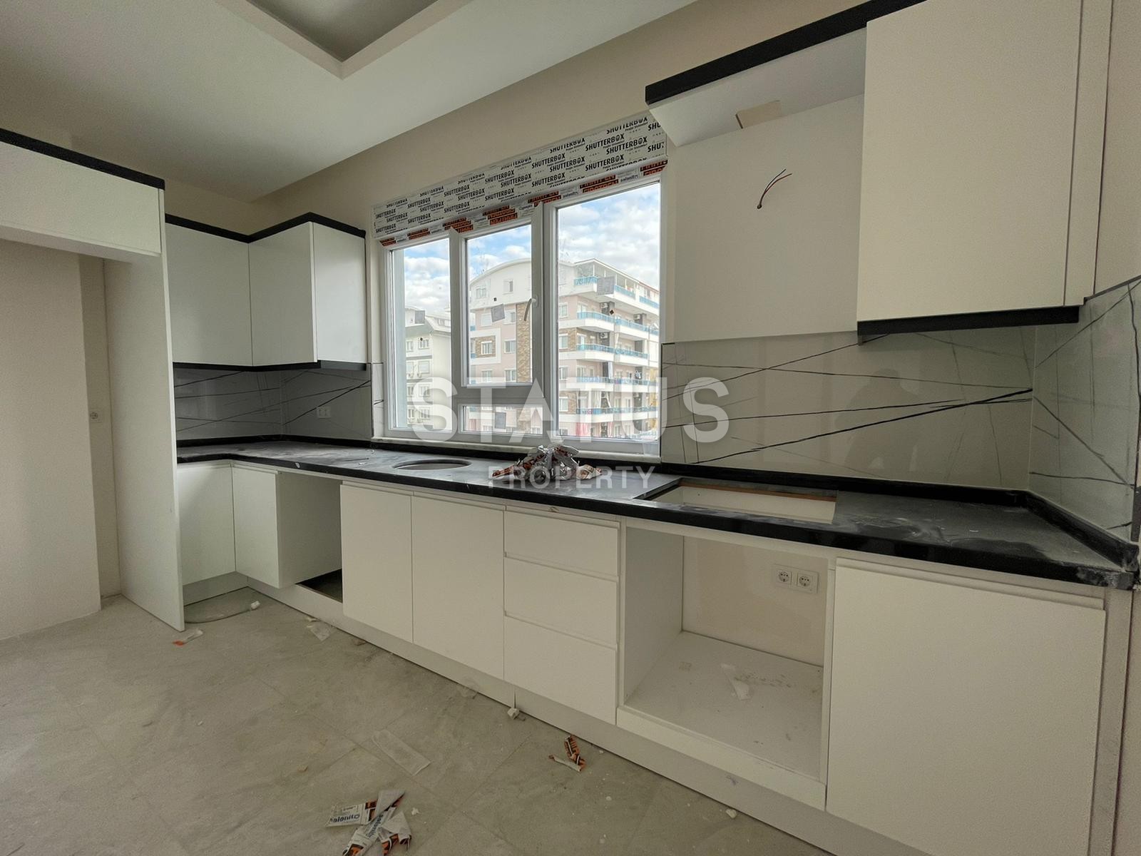 Апартаменты 1+1 в новом комплексе в центре Махмутлара, 45 м2. фото 10