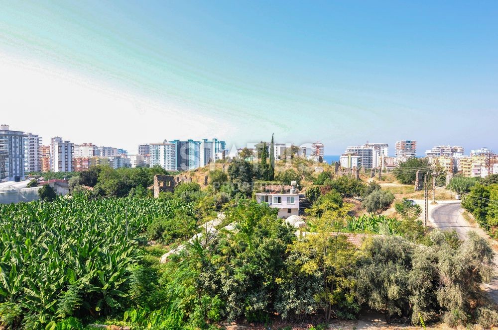 Квартира 1+1 с панорамным видом на море и г.Наула, 75 м2. В районе Махмутлар. фото 1