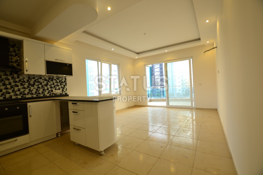 Недорогая квартира в Махмутларе в новом комплексе в 200 метрах от моря. 75 кв.м. фото 14