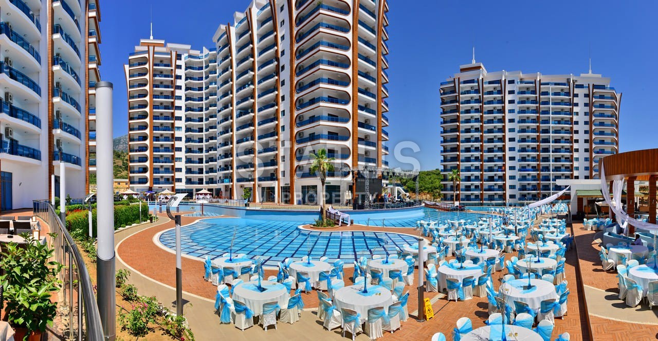 Две квартиры 1+1 в элитном комплексе, 68 м2. Махмутлар, Алания. фото 1