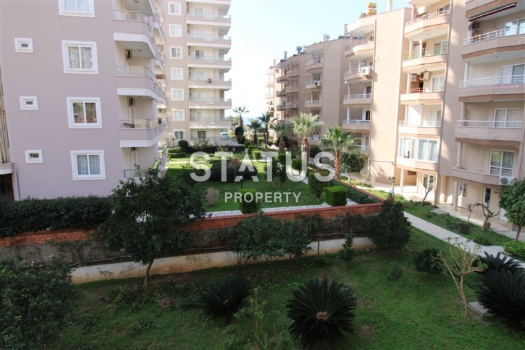 Квартира 2+1 в комплексе на первой береговой линии, 85 м2 в Махмутларе. фото 1