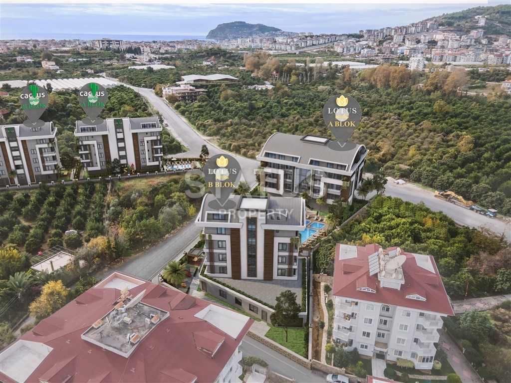 Apartments of different layouts in a complex under construction from 99m2. Both, Alanya.+commerce фото 13