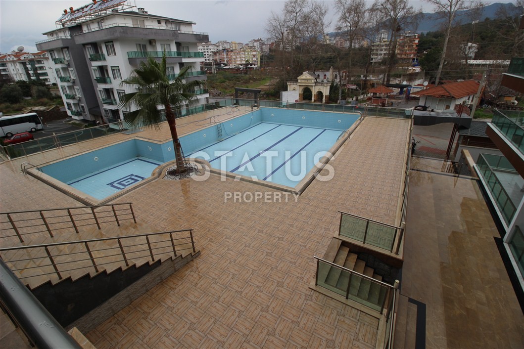 Apartment 1+1 with a private garden in Kestel, 70 m2 фото 3