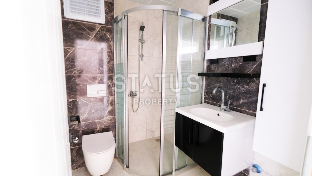 Квартира 1+1 в новом доме, 60 м2. Махмутлар, Алания. фото 9