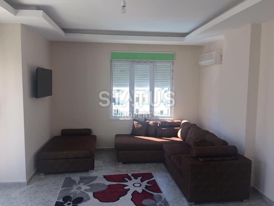 Квартира 1+1 в новом доме в Махмутларе с частичным видом на море, 68 м2 фото 3