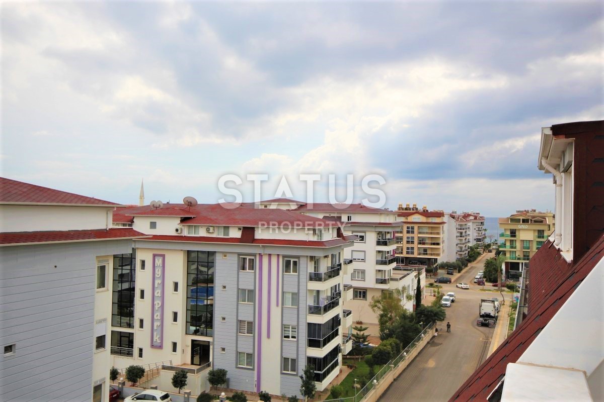 Меблированный дуплекс 2+1 с видом на море и горы в районе Кестель, 165 м2. фото 15