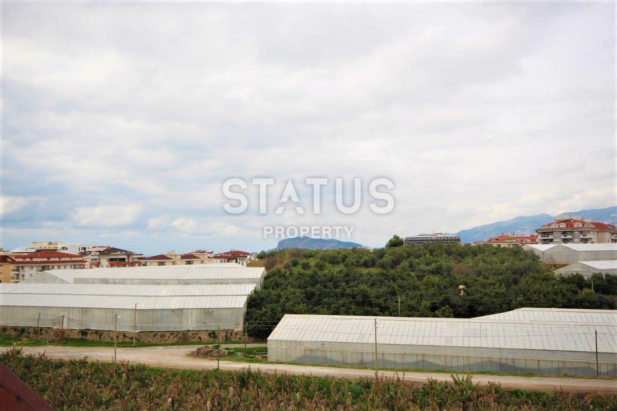 Меблированный дуплекс 2+1 с видом на море и горы в районе Кестель, 165 м2. фото 29