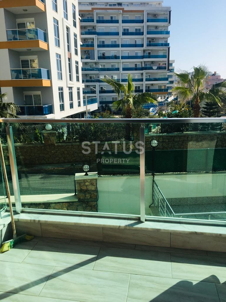 Большая двухкомнатная квартира в новом комплексе, 75 м2. Тосмур, Алания. фото 13