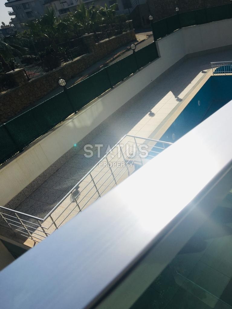 Большая двухкомнатная квартира в новом комплексе, 75 м2. Тосмур, Алания. фото 14