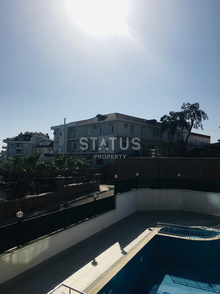 Большая двухкомнатная квартира в новом комплексе, 75 м2. Тосмур, Алания. фото 15