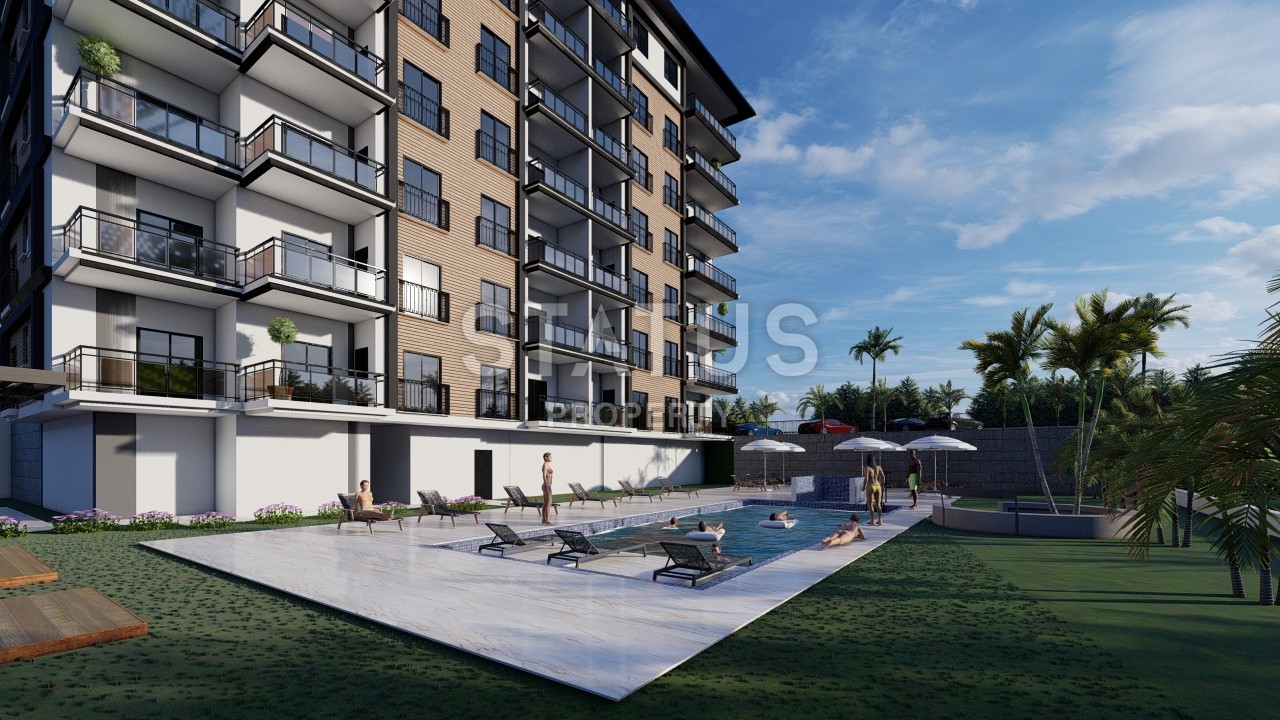 A new investment project at the excavation stage surrounded by a pine forest in the Avsallar region. фото 3