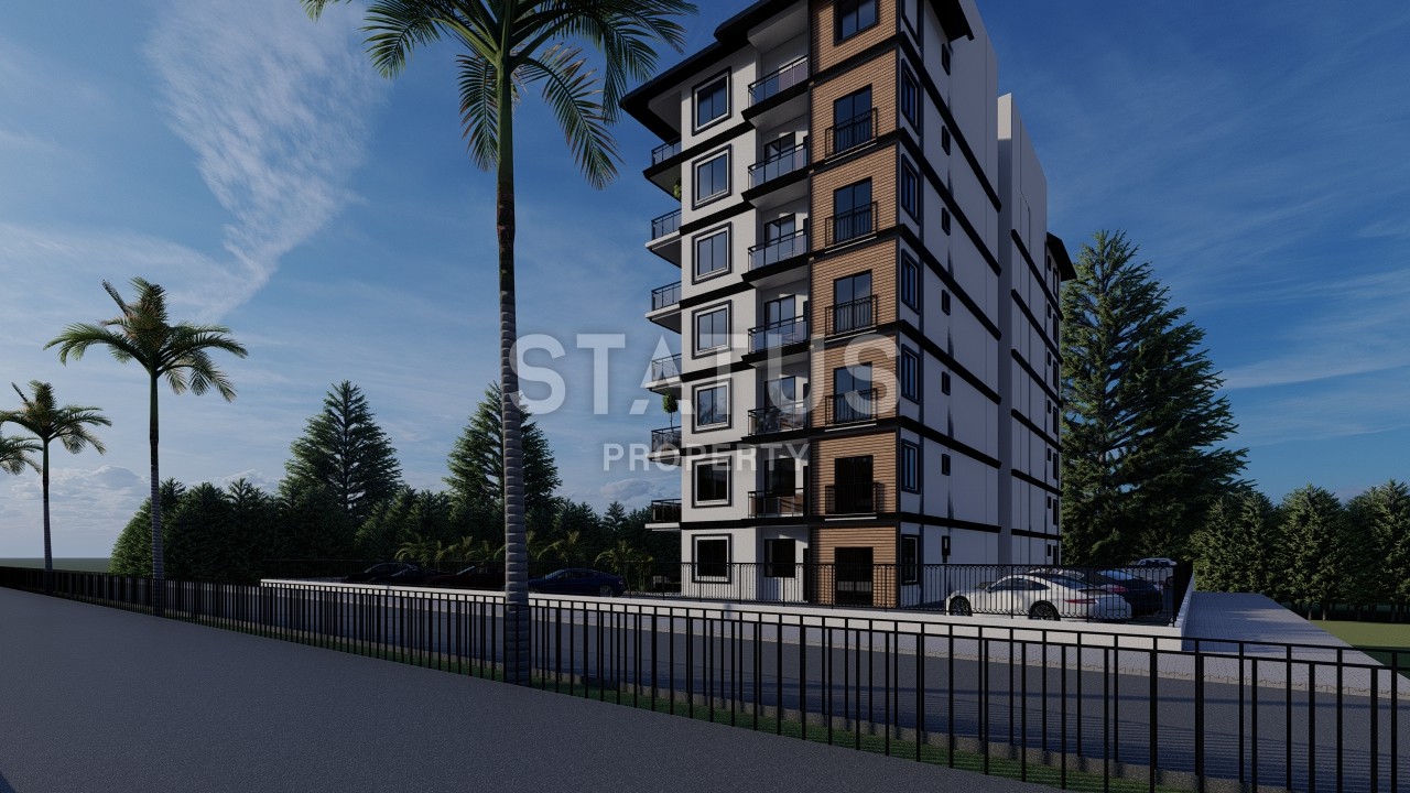 A new investment project at the excavation stage surrounded by a pine forest in the Avsallar region. фото 5